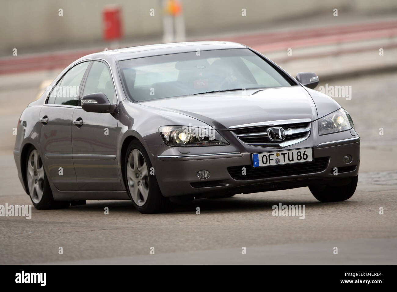 Honda Legend 3.5 SH-AWD, model year 2006-, anthracite, driving, diagonal  from the front, frontal view, test track Stock Photo - Alamy