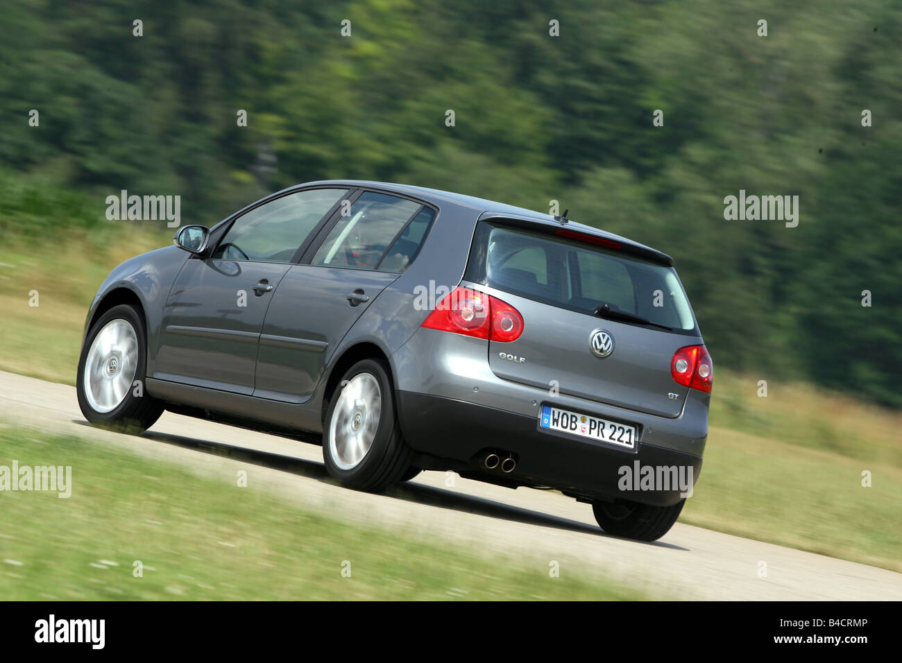 Talje krøllet Desværre VW Volkswagen Golf GT TSI 1.4, model year 2006-, anthracite, driving,  diagonal from the back, rear view, country road Stock Photo - Alamy