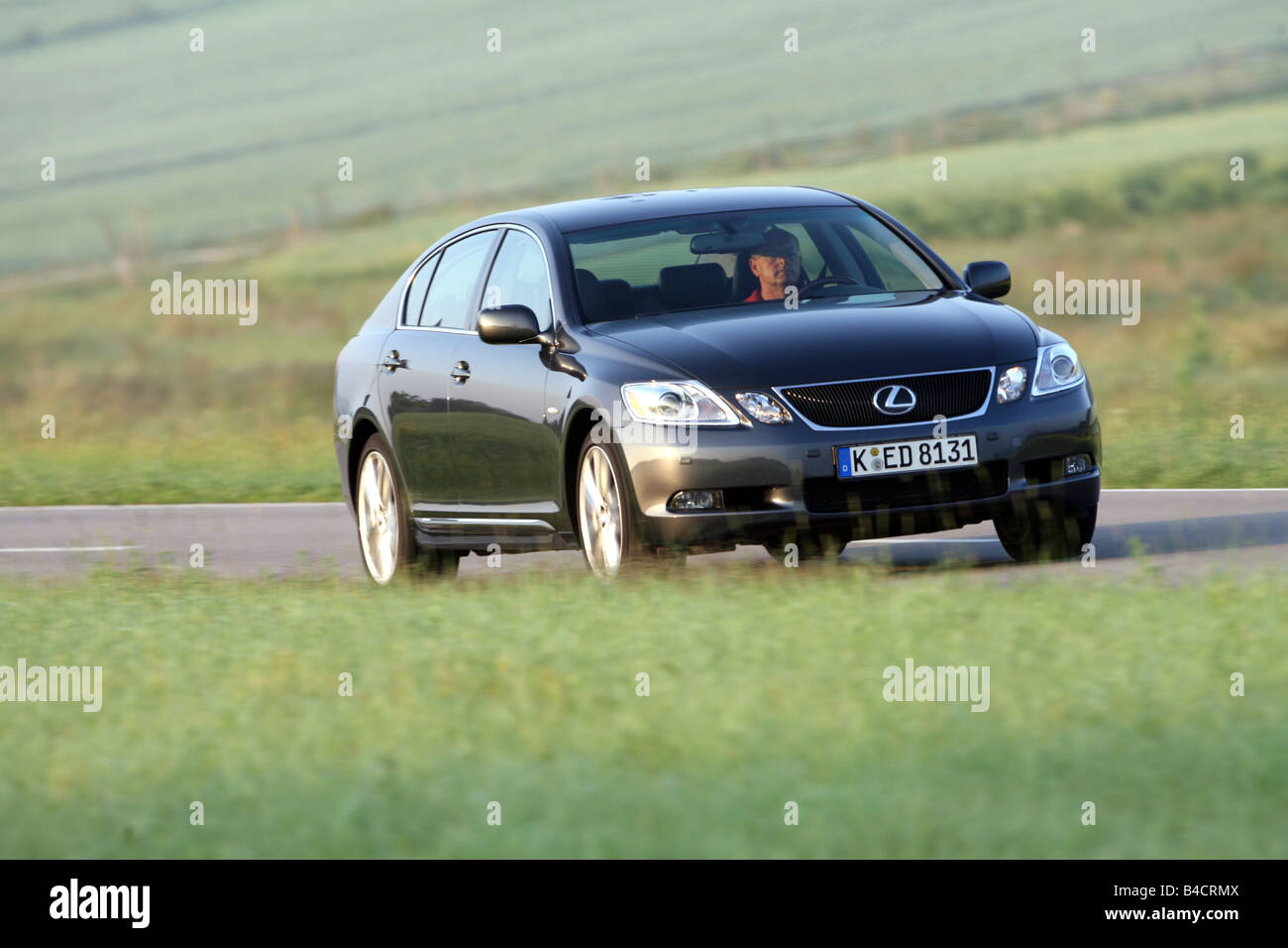 Lexus GS 450, model year 2006-, black, driving, diagonal from the front, frontal view, country road Stock Photo