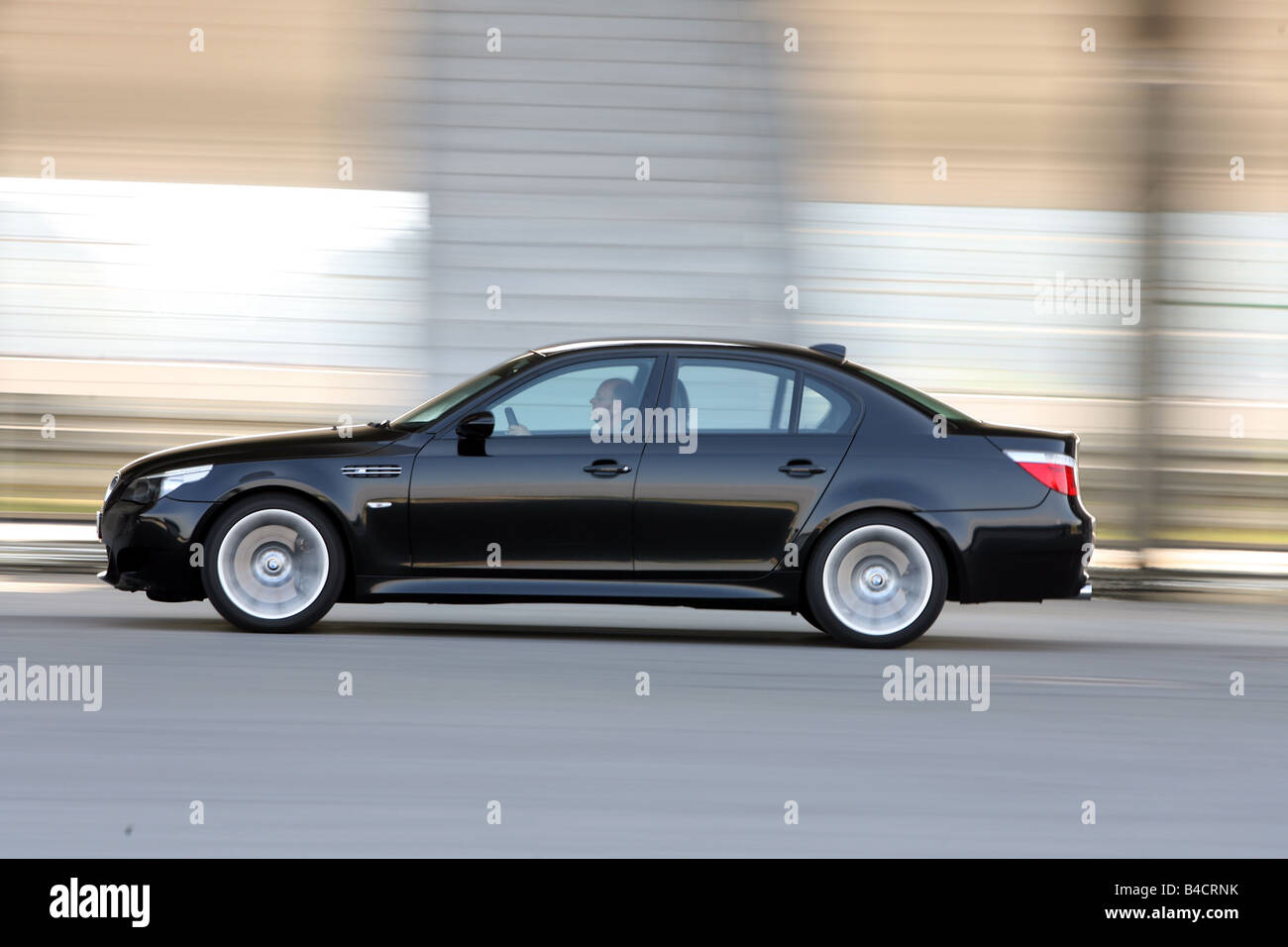 BMW M5, model year 2005-, black, driving, side view, City Stock Photo -  Alamy