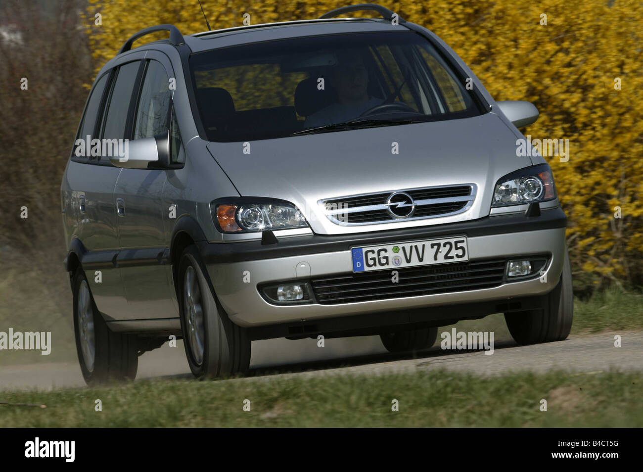 Car, Opel Zafira 2.2 DTI, model year 2003-, silver, Van, driving, country  road, diagonal from the front, Front view Stock Photo - Alamy