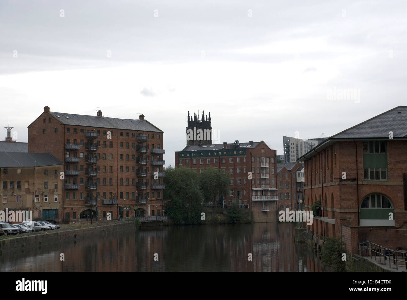 The river Aire flows through the Calls area of Leeds, UK. Stock Photo