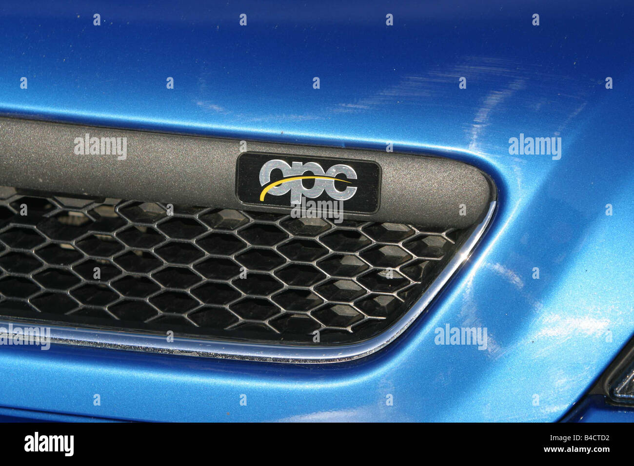 Car, Opel Astra OPC hatchback, Lower middle-sized class, model year 2002-,  blue, Detailed view, Model designation, grill, grill Stock Photo - Alamy