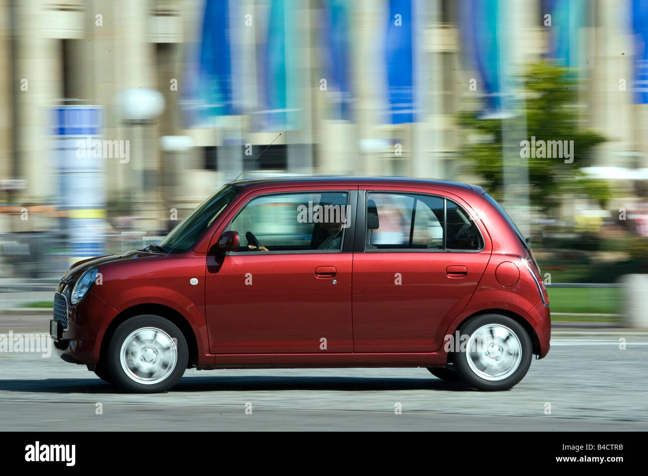 Daihatsu Trevis Model Year 2006 Ruby Colored Driving Side View