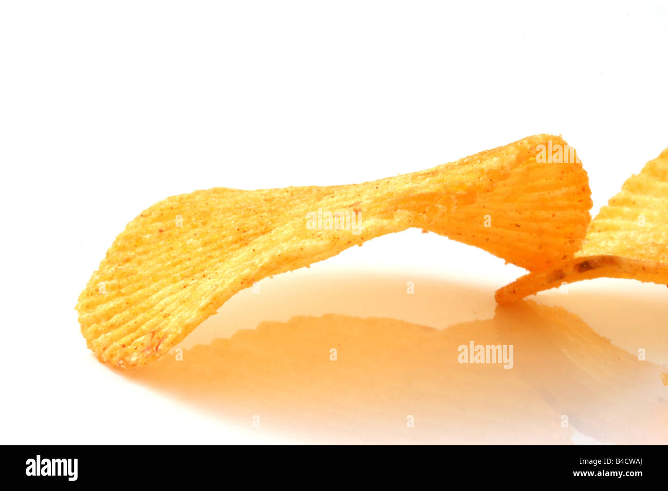 snack and junk food crispy potato chips isolated with copy space Stock