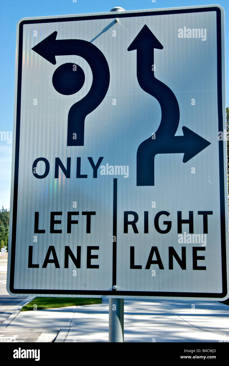 Reflective roundabout traffic lane control sign indicating lane a