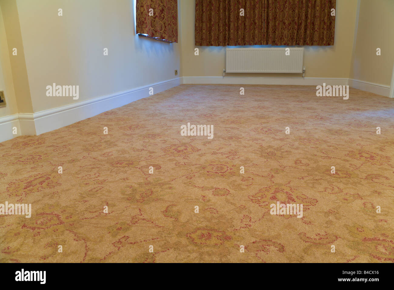 New fitted carpet in empty room Stock Photo Alamy