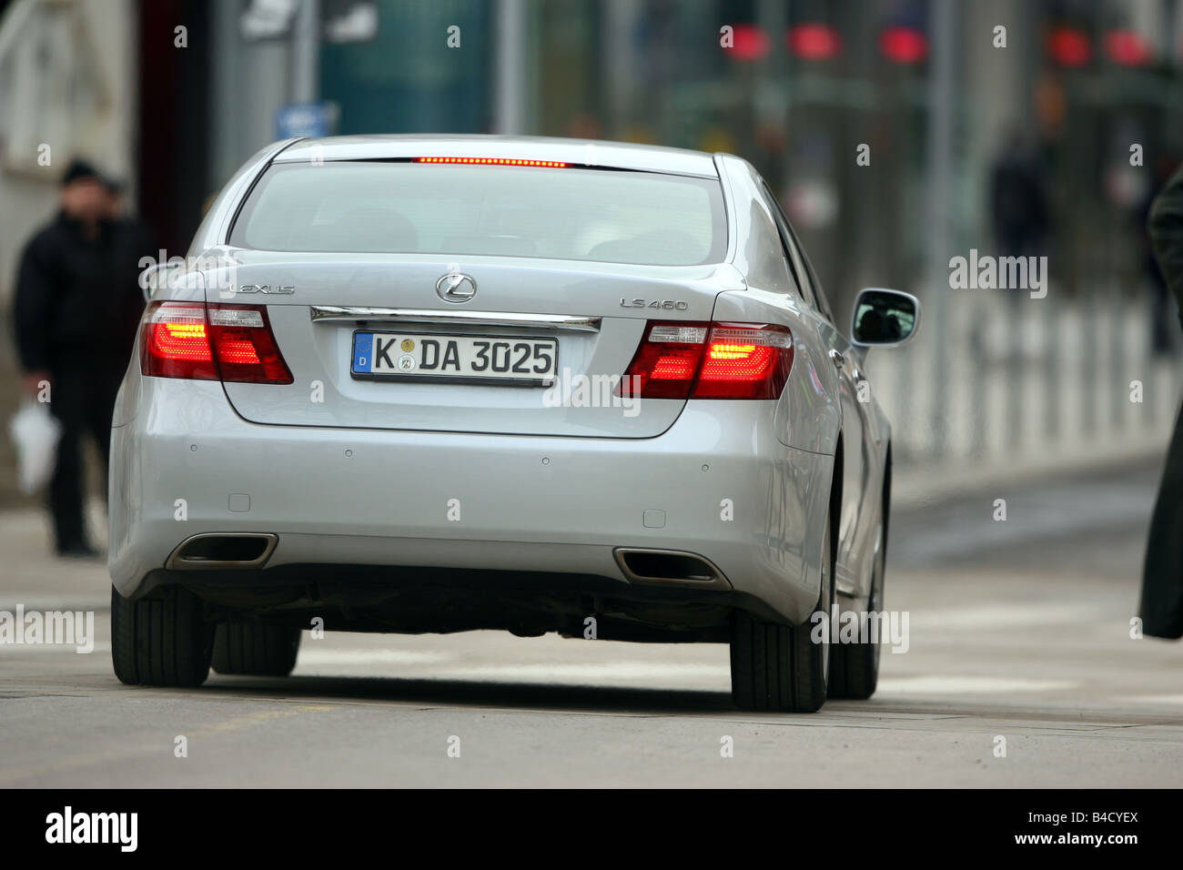 Lexus LS 460 Ambience Impression, model year 2007-, white, driving, diagonal from the back, rear view, City Stock Photo