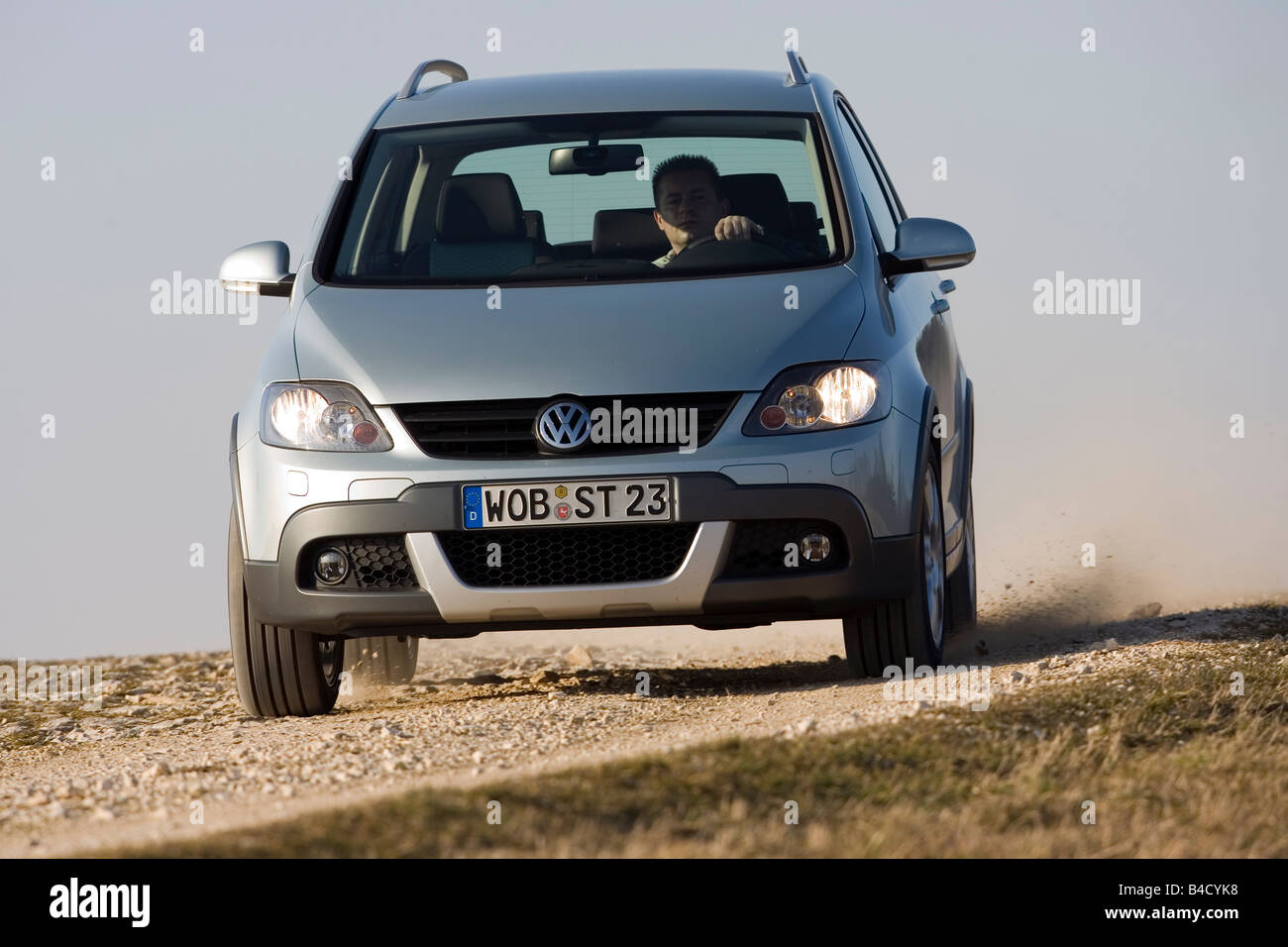 VW Volkswagen Cross Golf 1.4 TSI, model year 2007-, silver, driving,  diagonal from the front, frontal view, country road, offroa Stock Photo -  Alamy