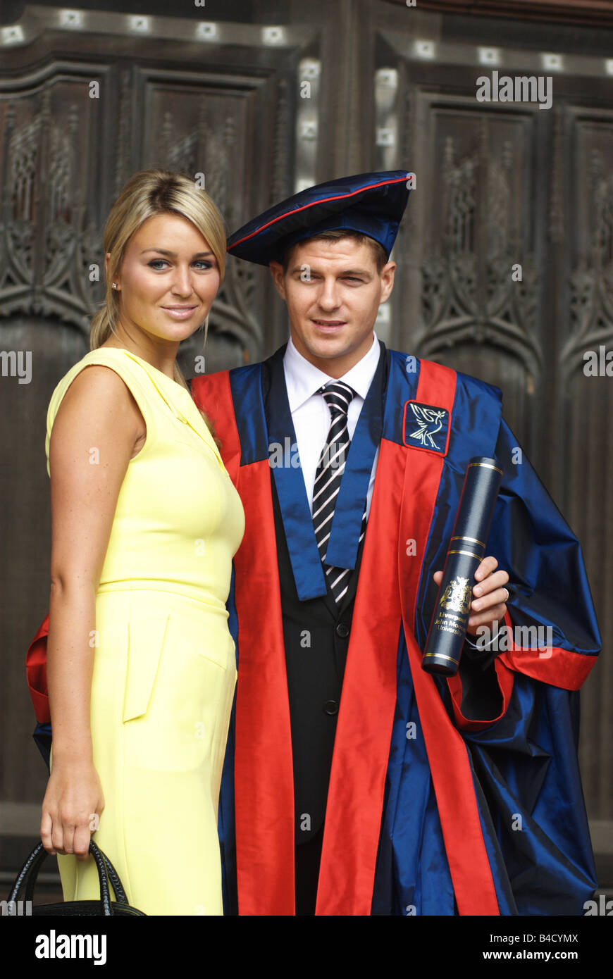 Steven Gerrard with wife Alex Curran received an Honorary Fellowship from Liverpool John Moores University. Stock Photo