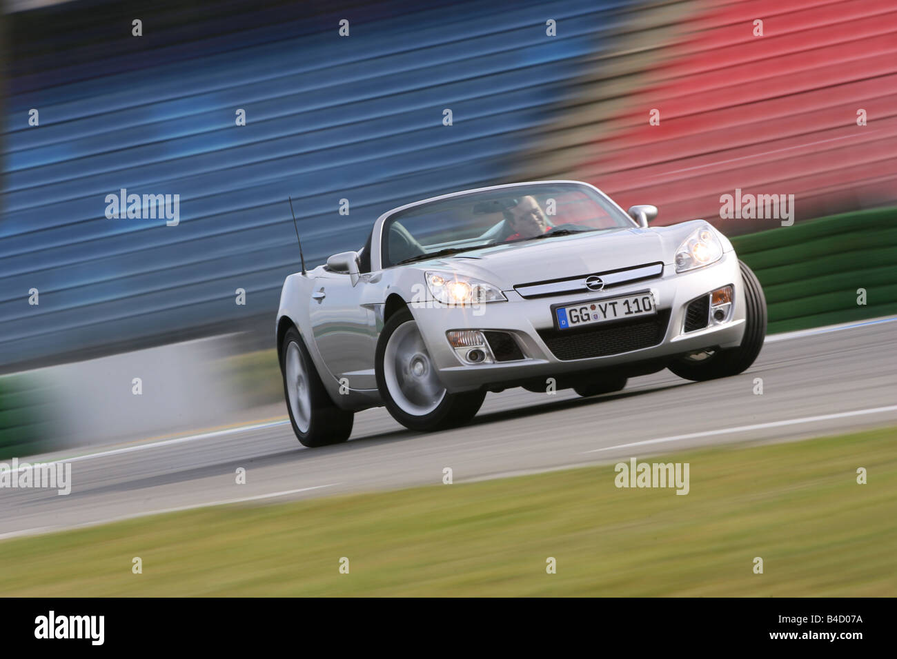 Opel Gt Model Year 07 Silver Driving Diagonal From The Front Stock Photo Alamy