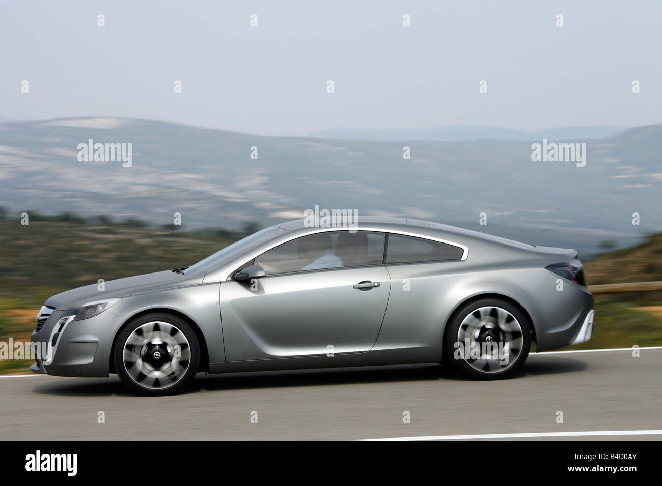 Opel GTC Study, model year 2007, anthracite, driving, side view, country road Stock Photo