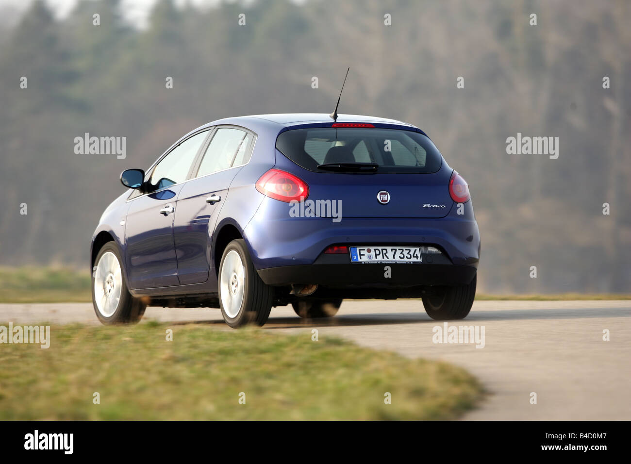 Fiat Bravo 1.9 Multijet 16V Emotion, model year, 2007-, dunkelblue moving, diagonal from the back, rear view, country road Stock Photo