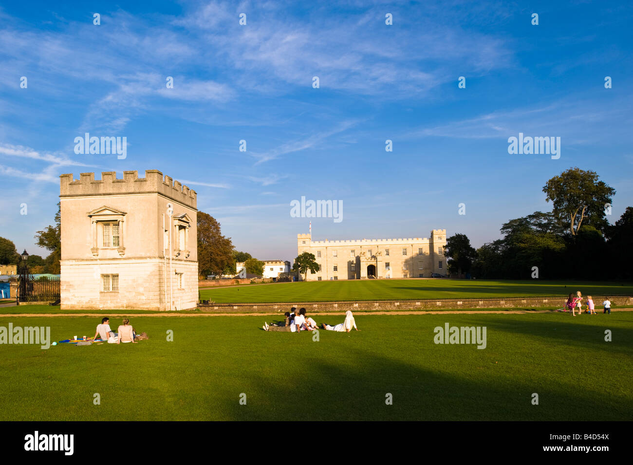 People relax by Syon House in Syon Park Brentford TW8 Middlesex London United Kingdom Stock Photo