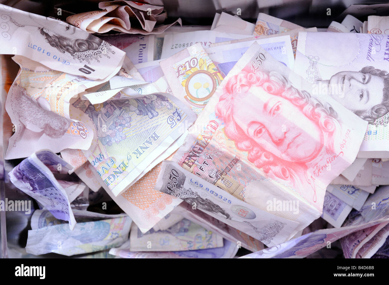 Unsorted pile of English Bank Notes. Stock Photo