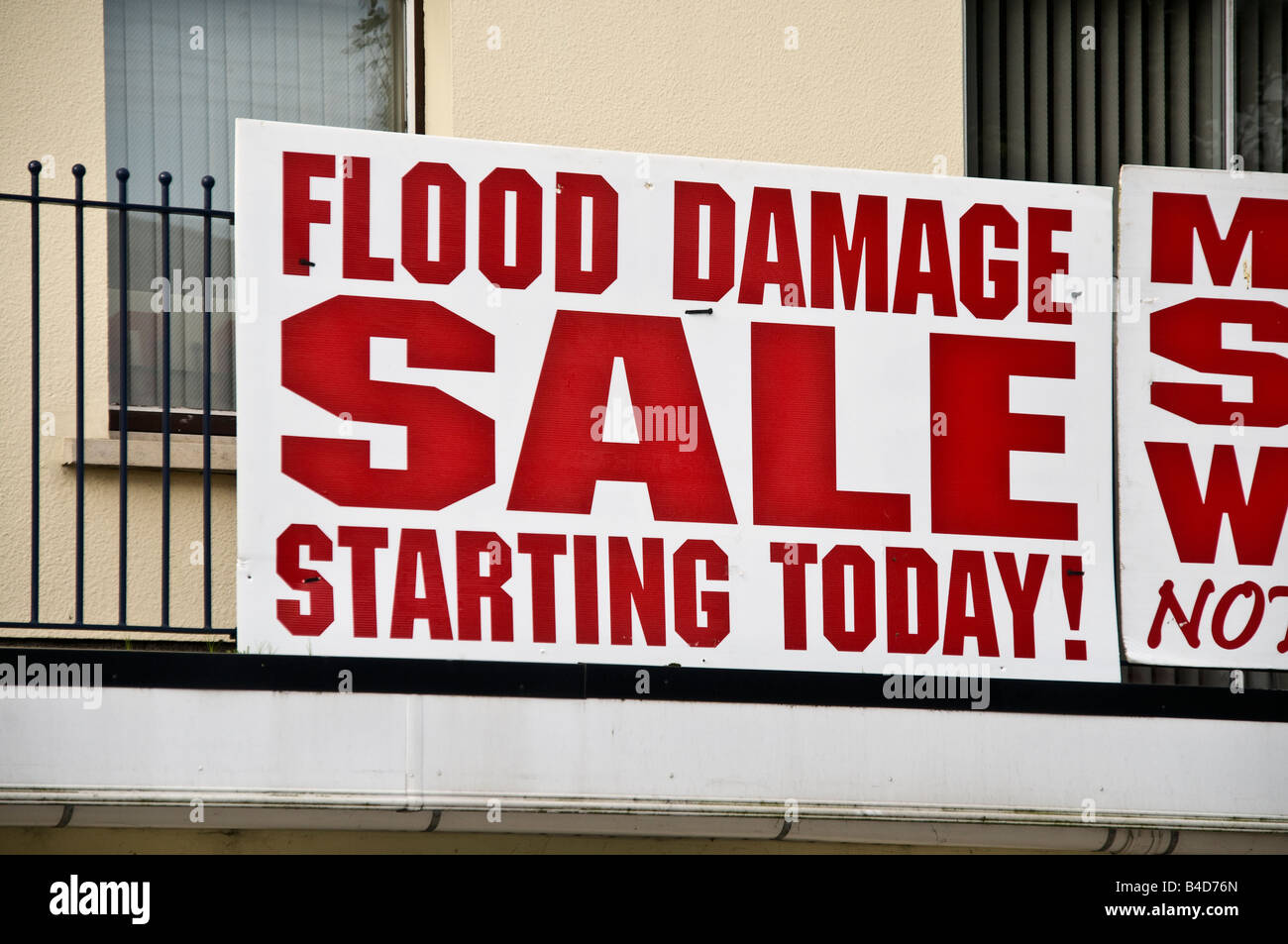 Shop sign - 'Flood damage Sale starting today!' Stock Photo