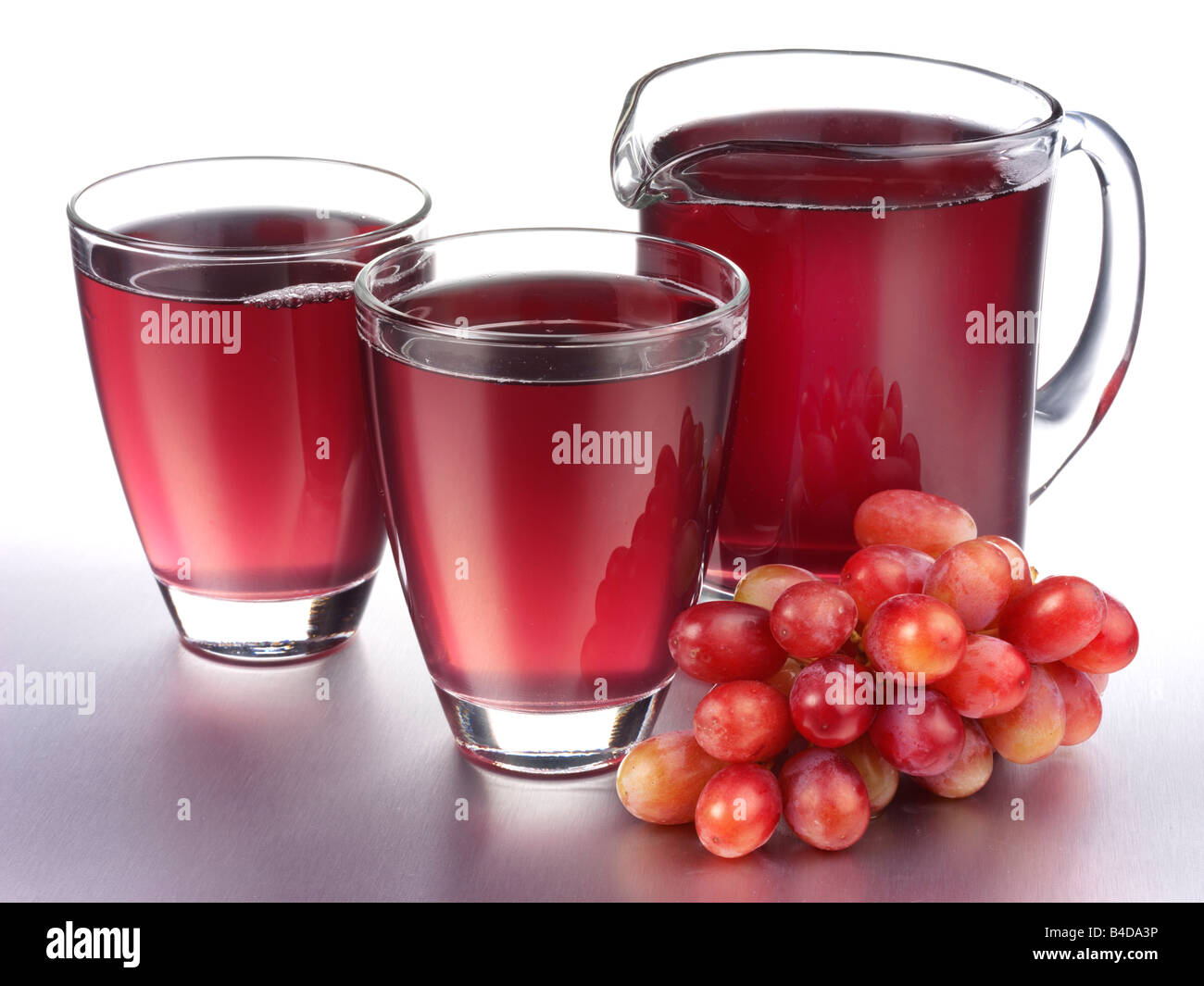 GLASS AND JUG OF RED GRAPE JUICE Stock Photo Alamy