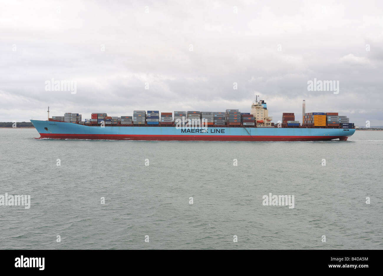 Container Ship leaves Southampton in the Solent Stock Photo