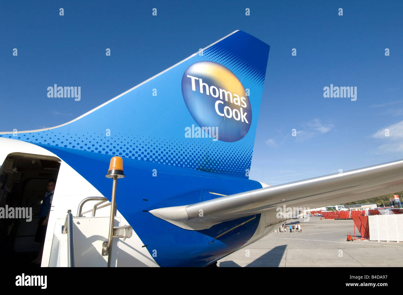The tail plane of a Thomas Cook Boeing 757 200 holiday jet airliner at Rhodes airport Greece Stock Photo