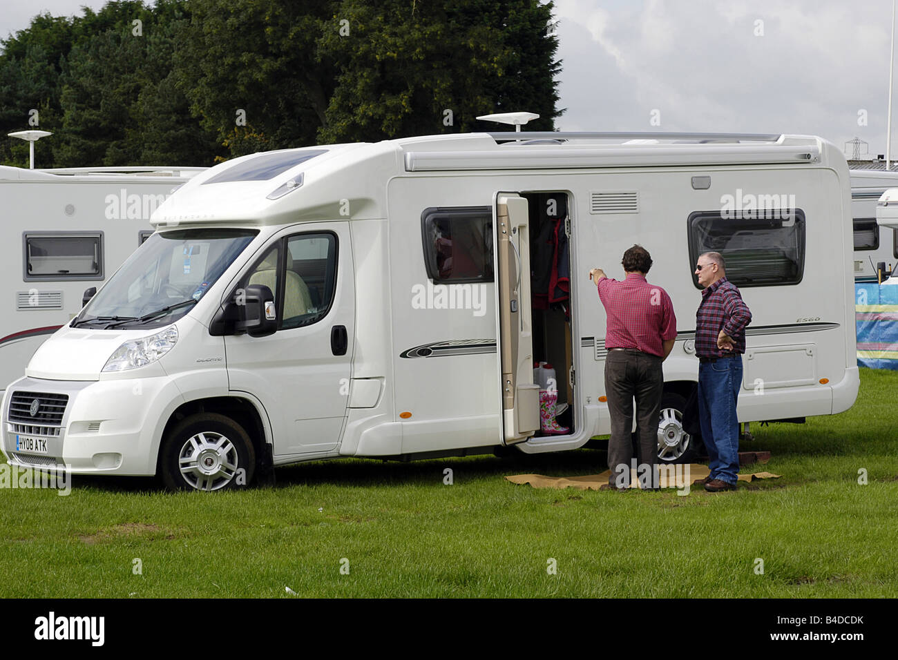 Motorhome at a basic campsite in England during the wet summer Stock Photo