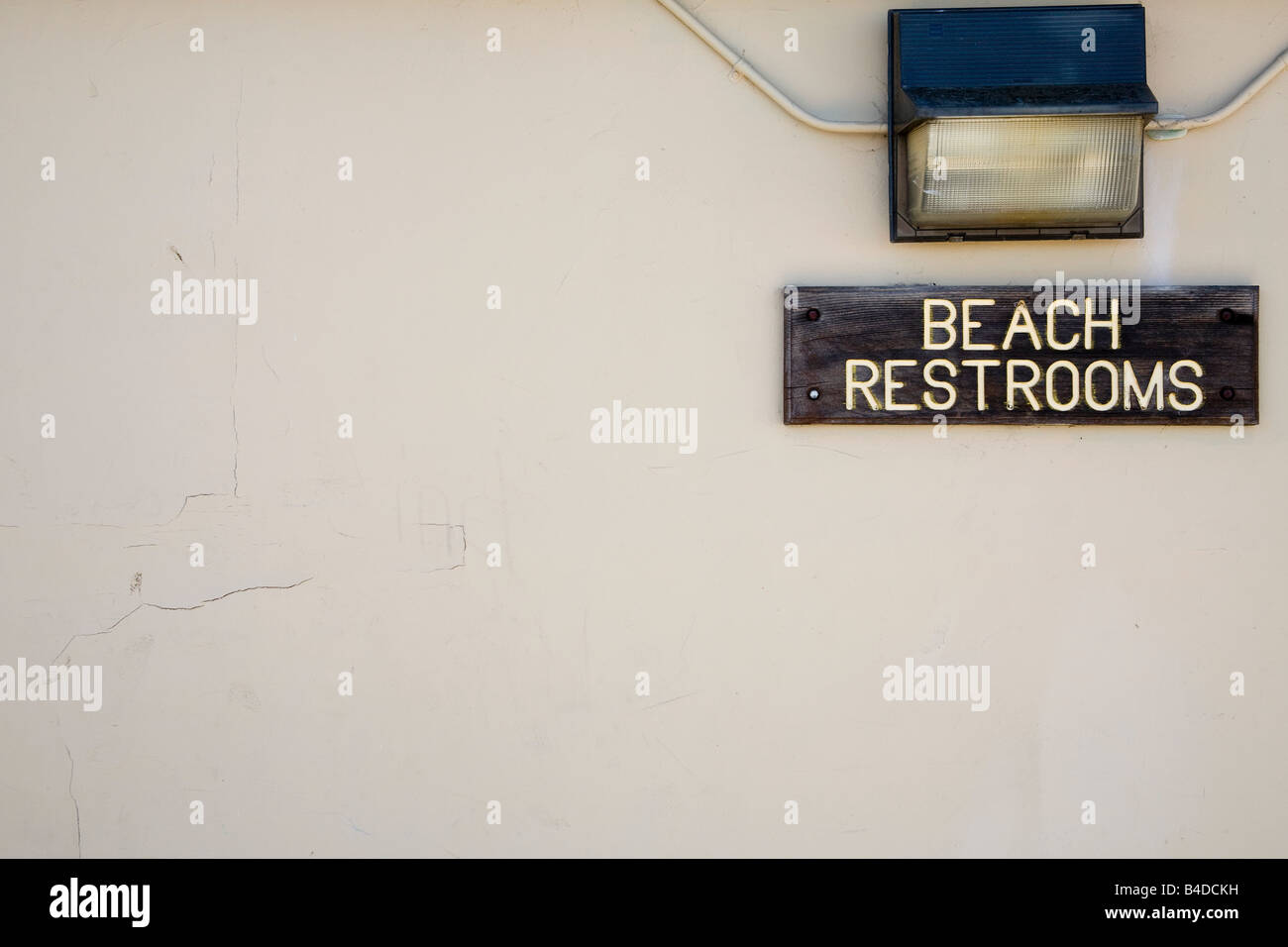 Sign for the beach restrooms at the Santa Cruz Beach Boardwalk in Santa Cruz California USA Stock Photo