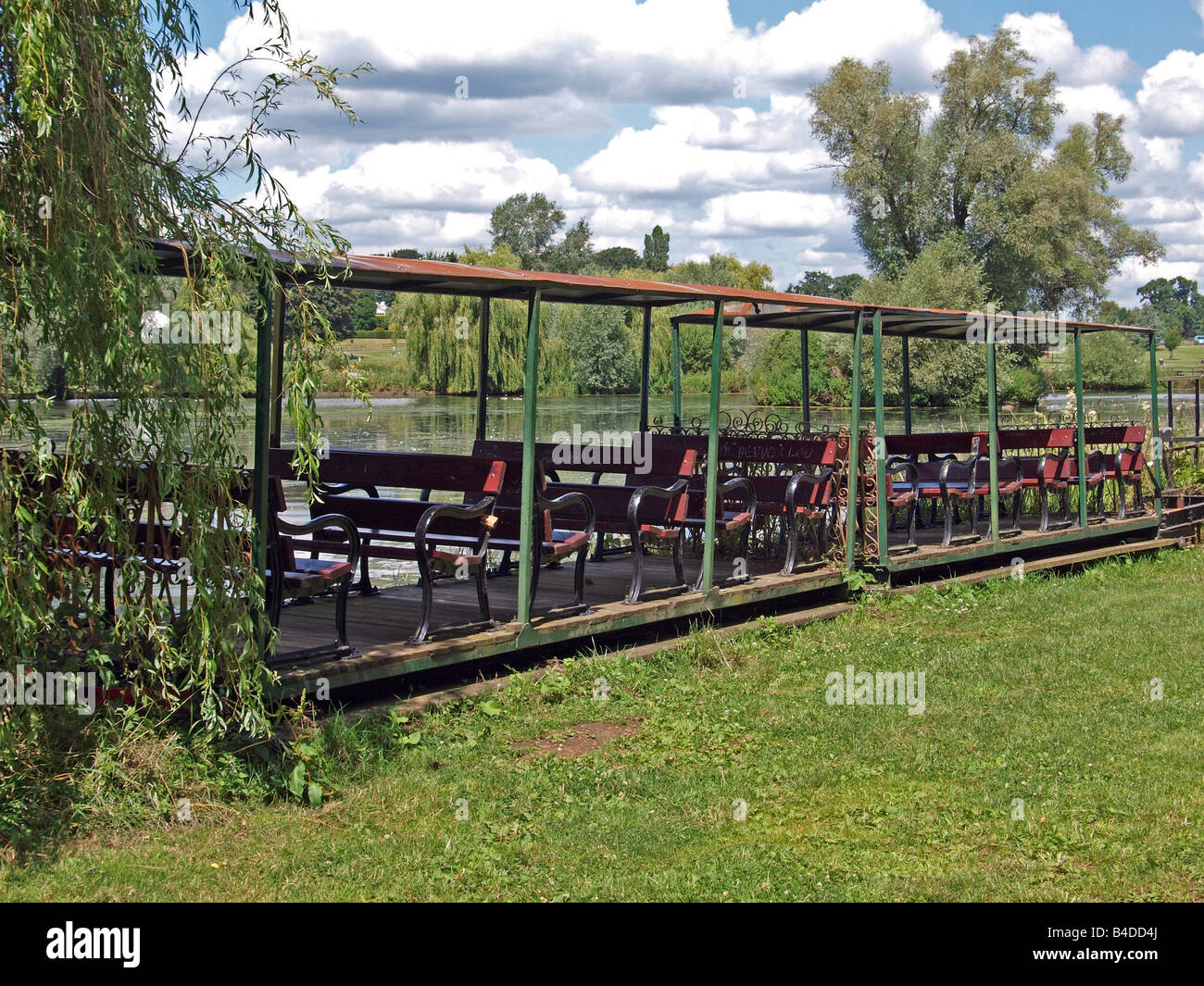 Disused railway carriages, now used as park seats. Stock Photo