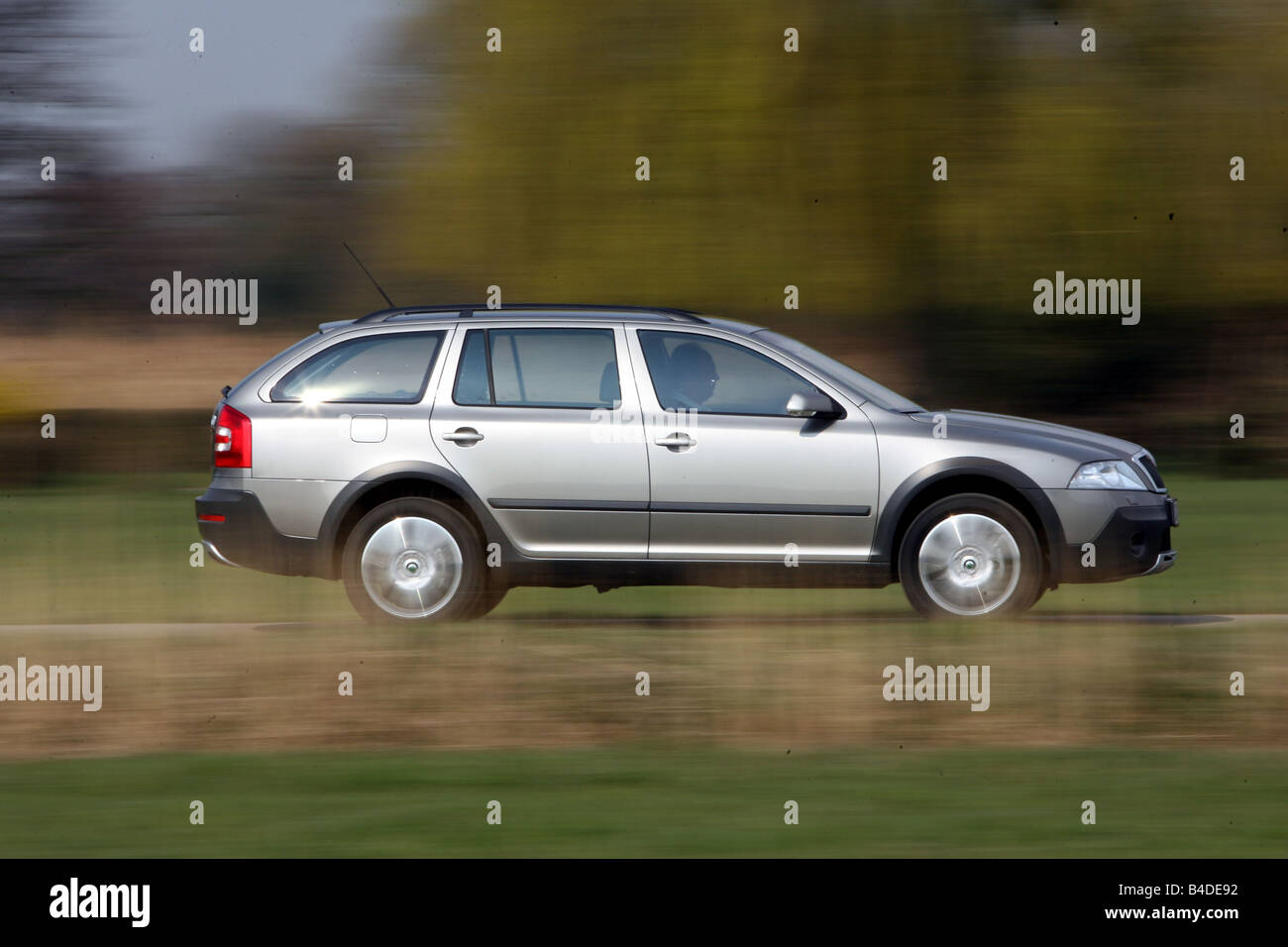 Skoda Octavia Combi Scout, model year 2007-, silver, driving, side view,  country road Stock Photo - Alamy