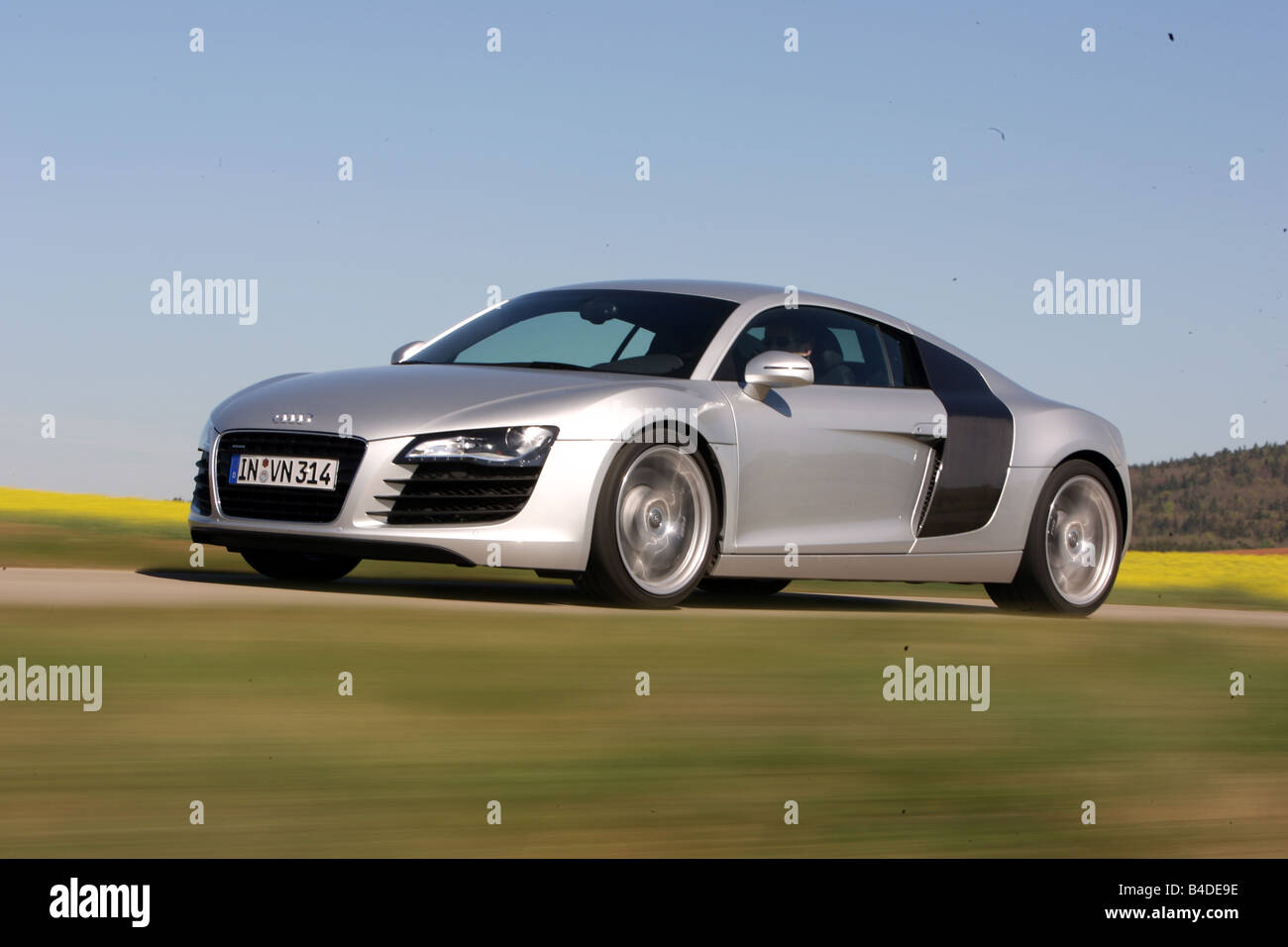 Audi R8 4.2 FSI, model year 2007-, silver, driving, diagonal from the front, frontal view, country road Stock Photo