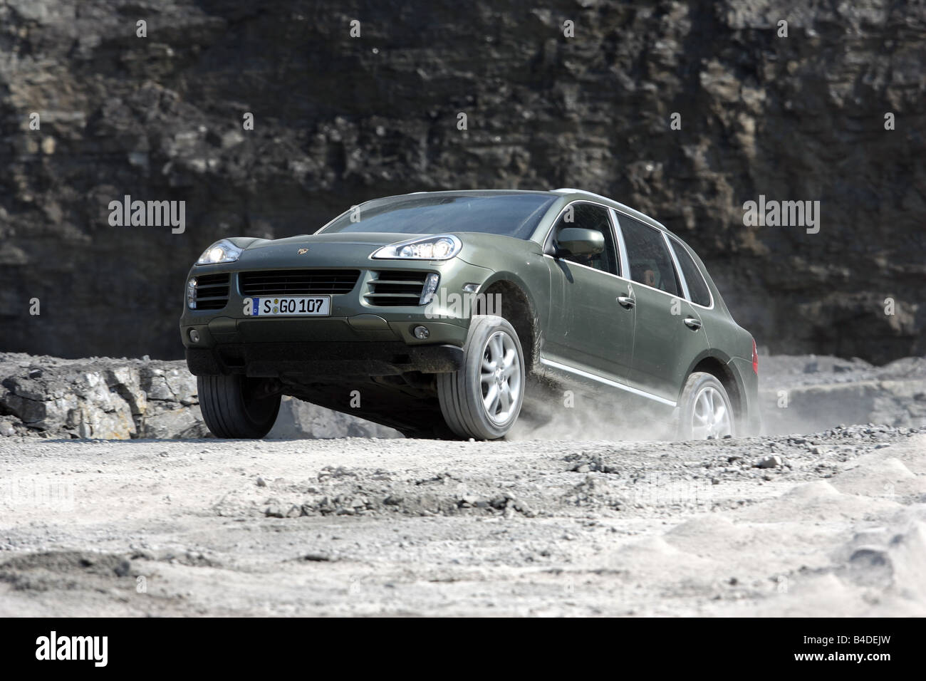 Porsche Cayenne, model year 2005, silver, driving, diagonal from the