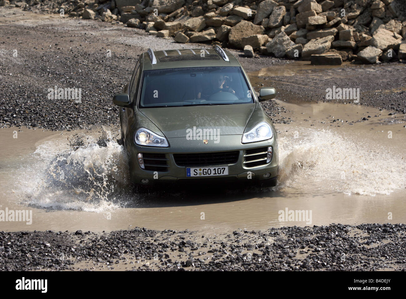 Porsche Cayenne, model year 2005, silver, driving, diagonal from the