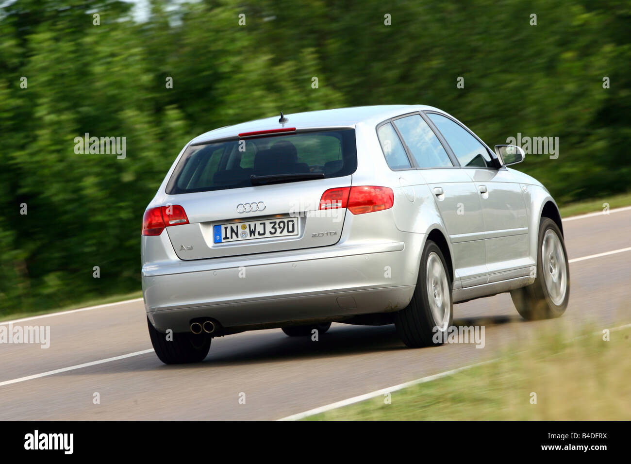 Audi A3 Sportback 2.0 TDI Ambition, model year 2007-, silver, driving,  diagonal from the back, rear view, country road Stock Photo - Alamy