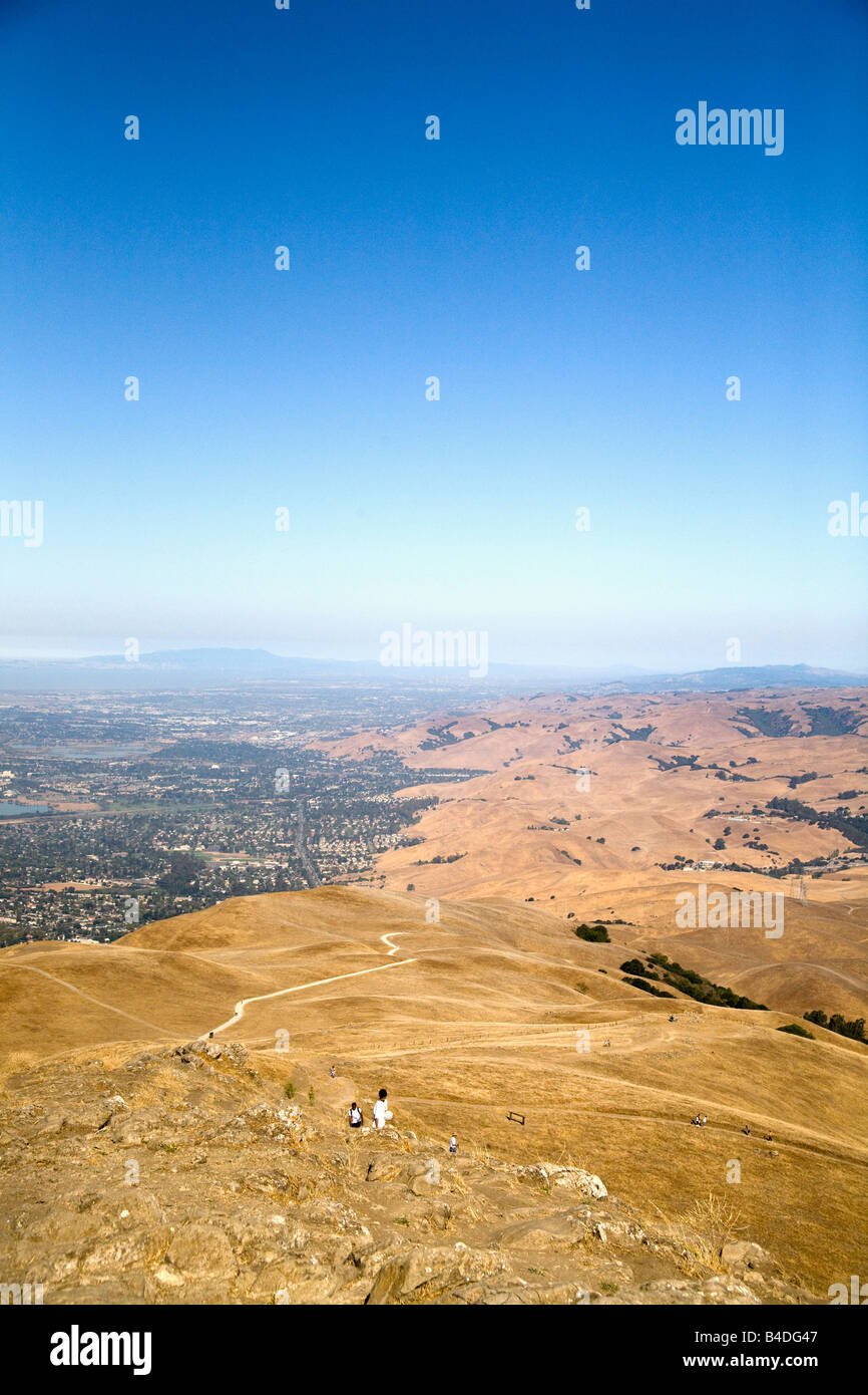 The Peak Trail at Mission Peak Regional Preserve winds up from the city of Fremont and Ohlone College, to the left. Stock Photo