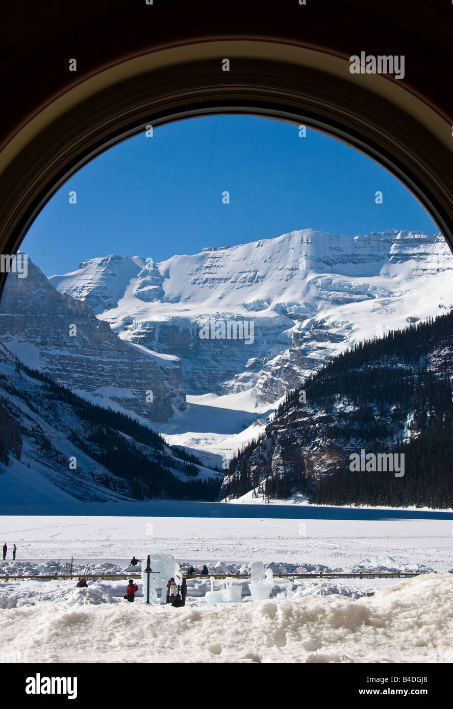 Victoria glacier seen through the oval restaurant window at Fairmont chateau lake louise Stock Photo