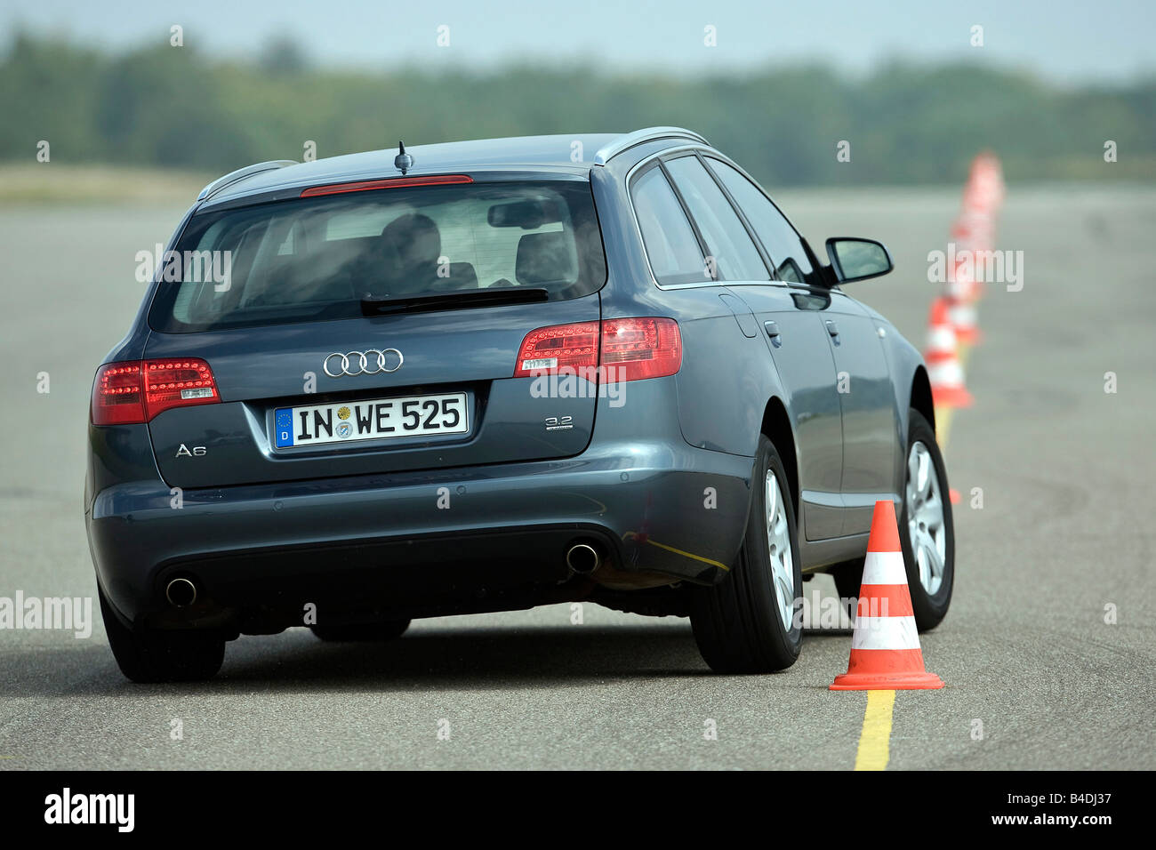 Audi A6 Avant 3.2 FSI Quattro, model year 2005-, anthracite, driving,  diagonal from the back, rear view, Pilonen, test track Stock Photo - Alamy
