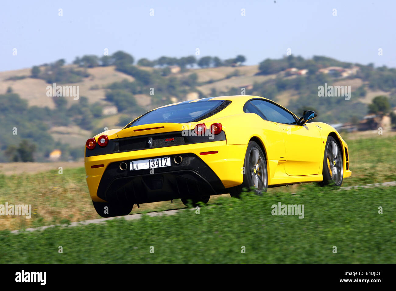Ferrari 430 Scuderia, model year 2007-, yellow, driving, diagonal from ...