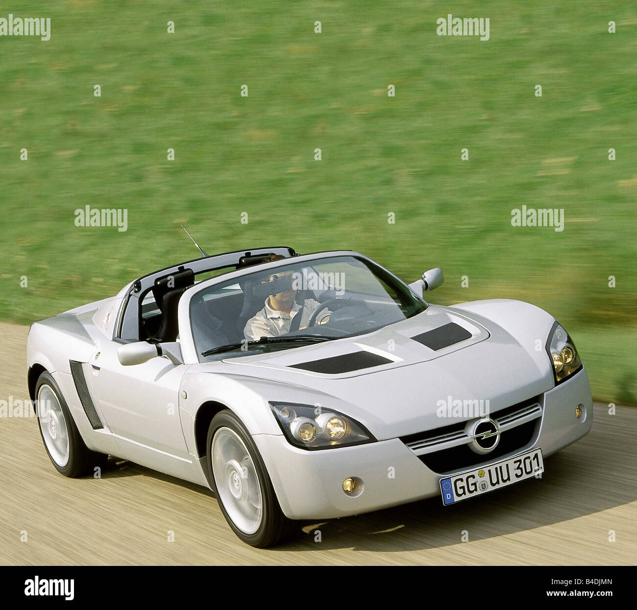 Car, Opel Speedster, model year 1999-, Convertible, silver, diagonal from  the front, driving, ams 17/2000, Seite 038 Stock Photo - Alamy