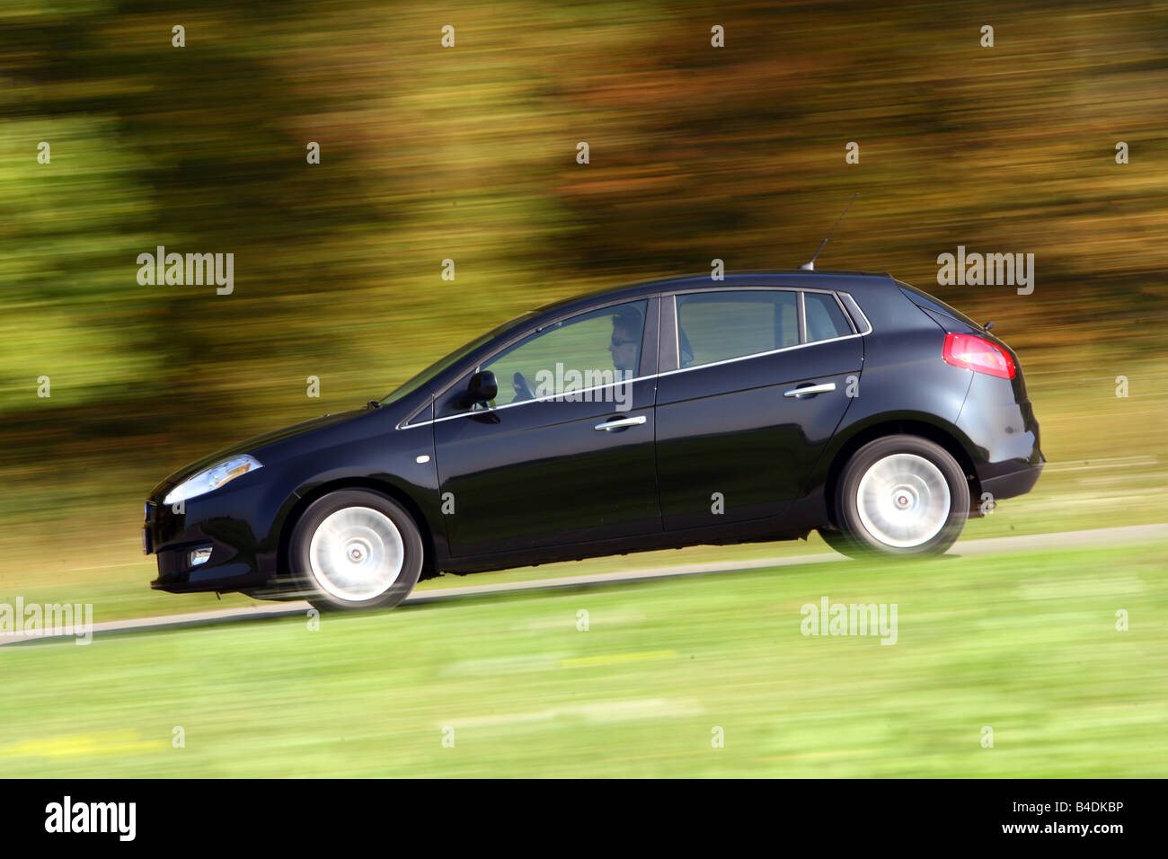 Fiat Bravo 1.4 T-Jet 16V Emotion, model year 2007-, black, driving, side view, country road Stock Photo