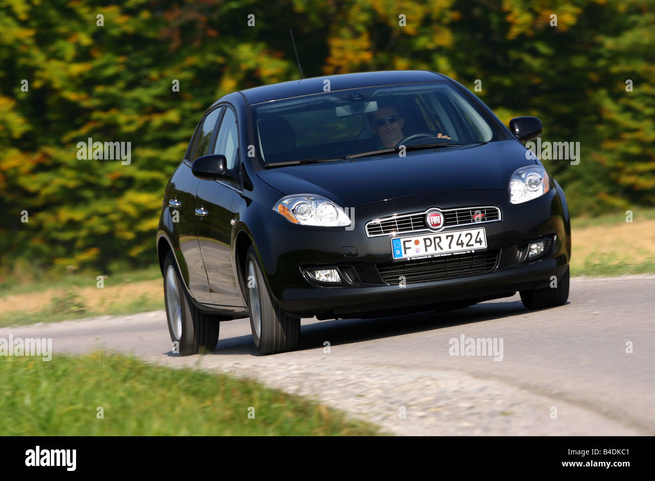 Fiat Bravo 1.4 T-Jet 16V Emotion, model year 2007-, black, driving, diagonal from the front, frontal view, country road Stock Photo