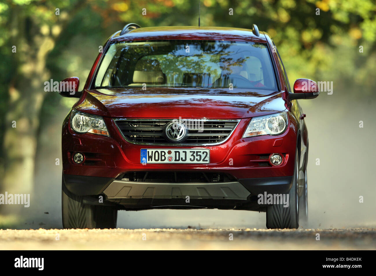 VW Volkswagen Tiguan 1.4 TSI Track & Field, model year 2007-, red, driving,  diagonal from the front, frontal view, country road Stock Photo - Alamy