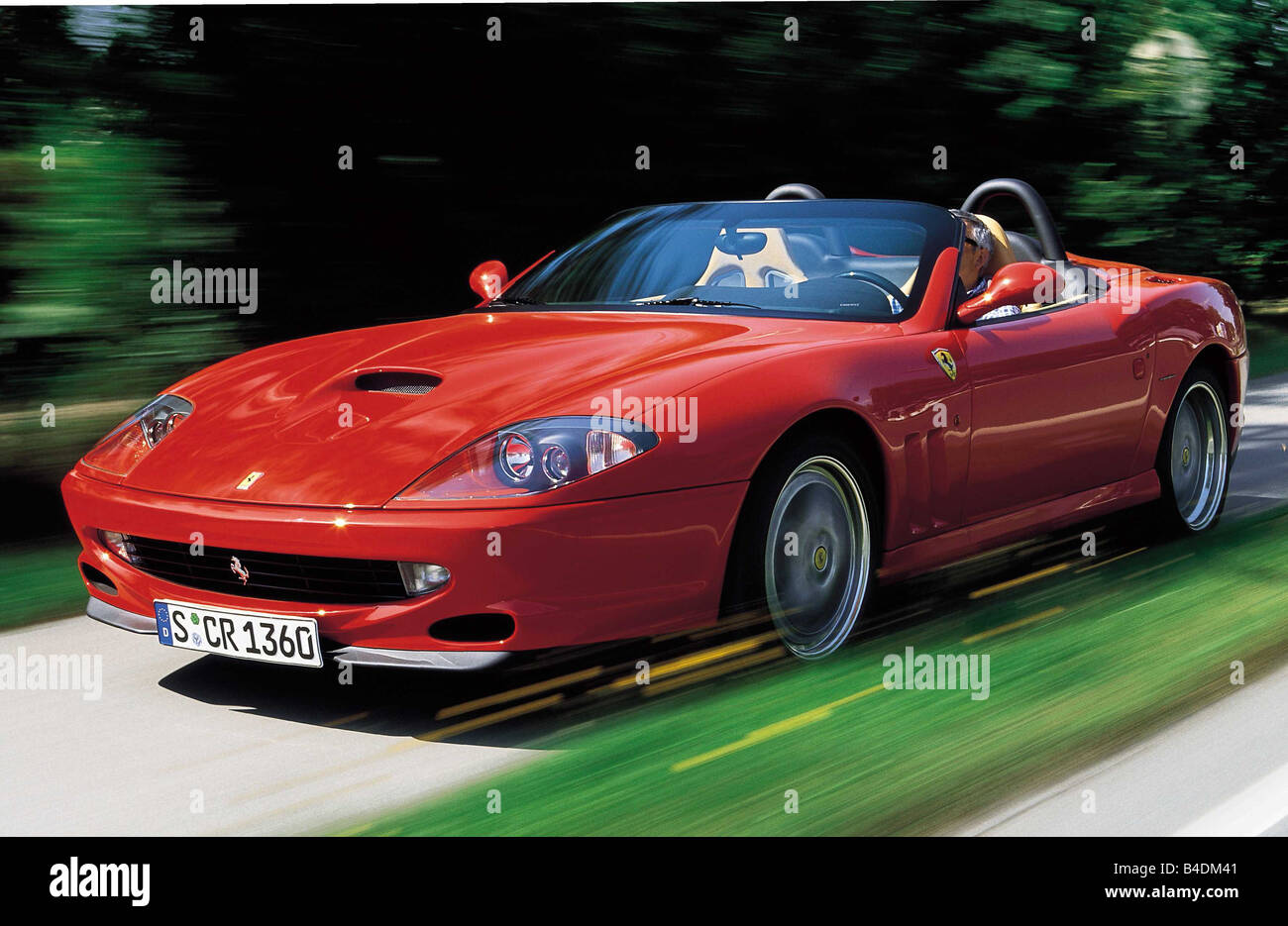 Car, Ferrari 550 Barchetta Pininfarina, red, model year 2001-, driving, diagonal from the front, Convertible, ams 18/2001, Seite Stock Photo
