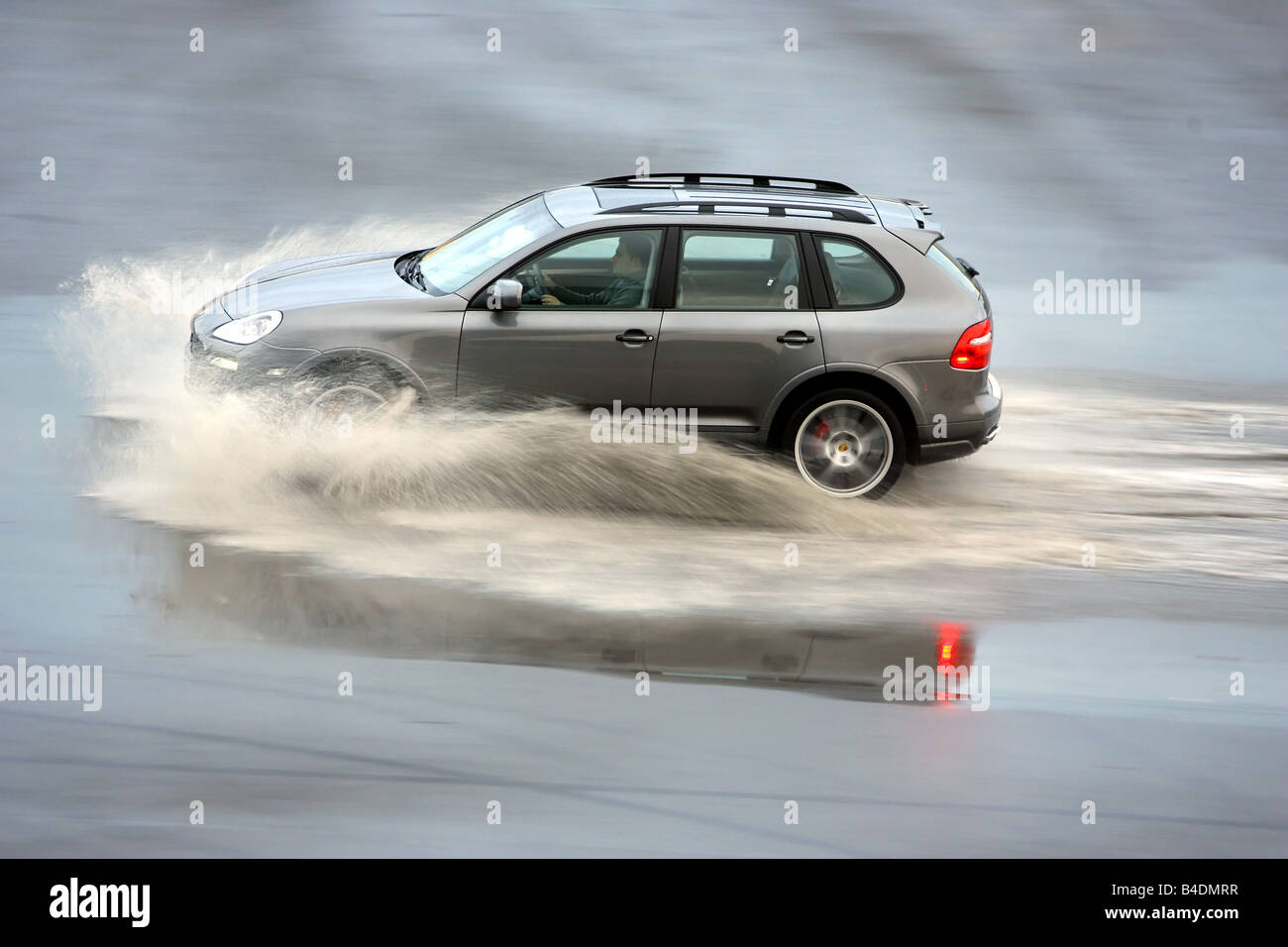 Porsche Cayenne GTS, model year 2007, anthracite, driving, side view, test track, Aquaplaning