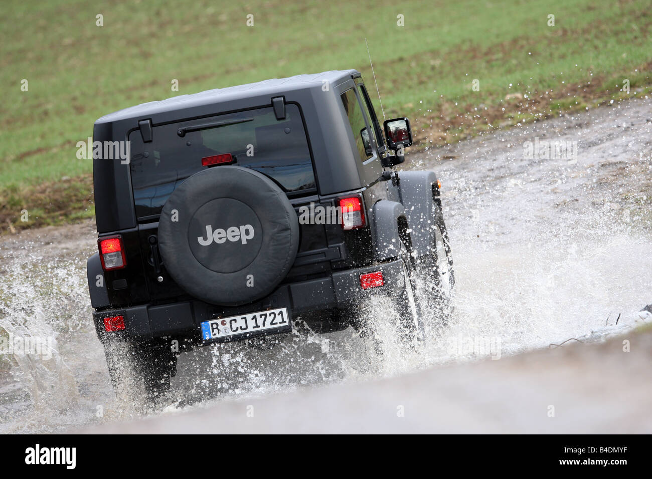 Jeep Wrangler Rubicon , model year 2008-, black, driving, diagonal from  the back, rear view, offroad, Water Stock Photo - Alamy