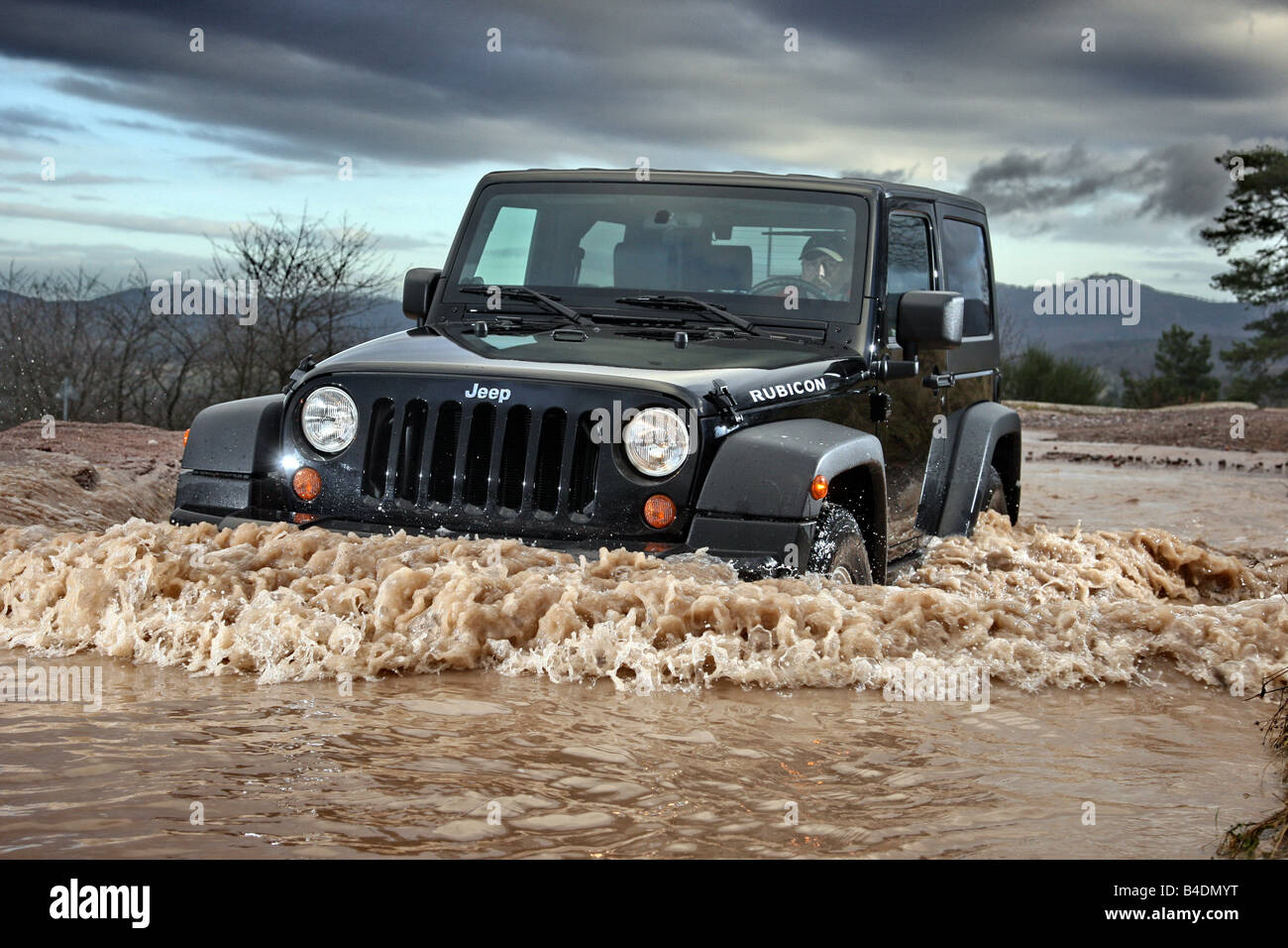 Jeep Wrangler Rubicon , model year 2008-, black, driving, diagonal from  the front, frontal view, offroad, Water Stock Photo - Alamy