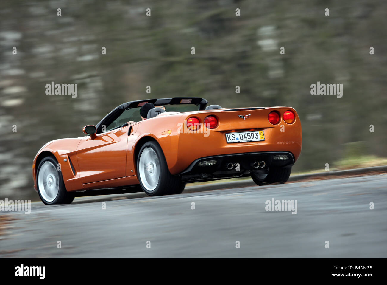 Corvette C6, rust-red model year 2008, orange -metallic, driving ...