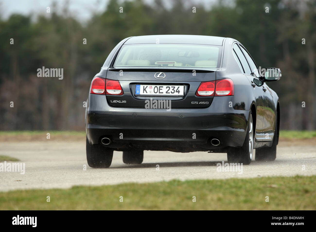 Lexus GS 460, model year 2008-, dunkelblue moving, diagonal from the back, rear view, country road Stock Photo