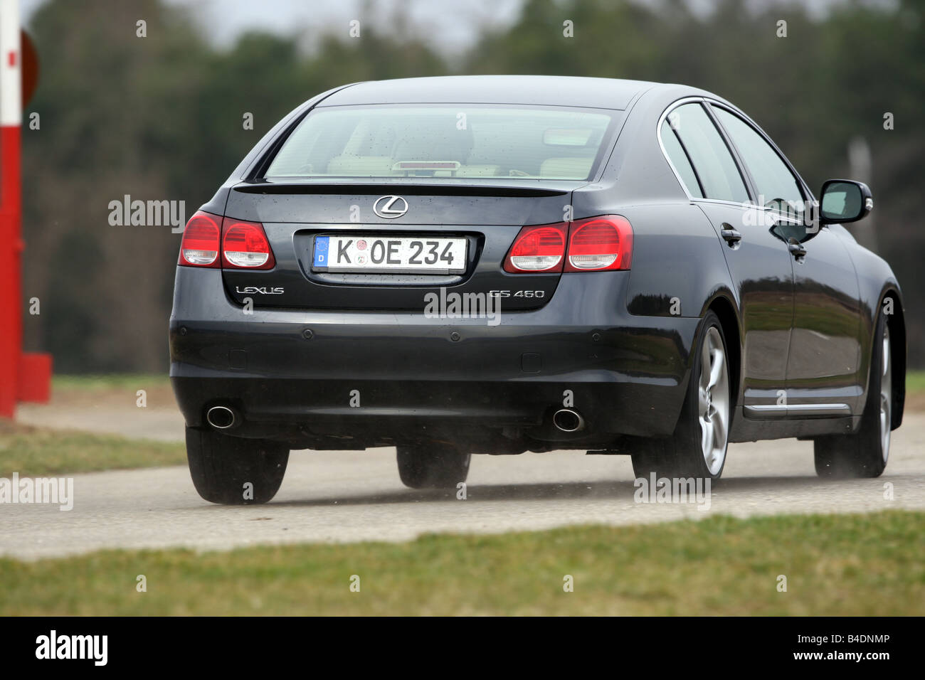 Lexus GS 460, model year 2008-, dunkelblue moving, diagonal from the back, rear view, country road Stock Photo