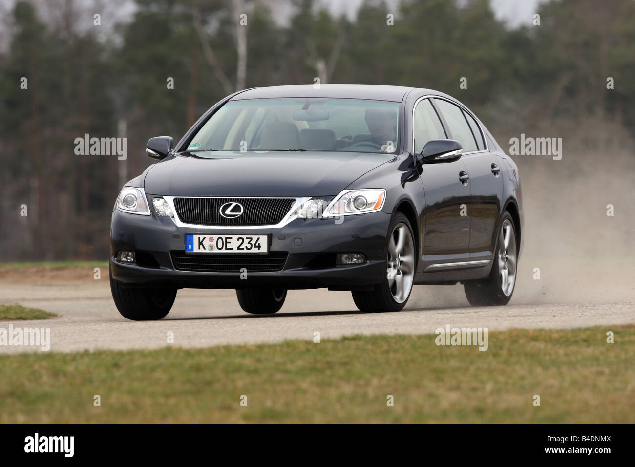 Lexus GS 460, model year 2008-, dunkelblue moving, diagonal from the front, frontal view, country road Stock Photo