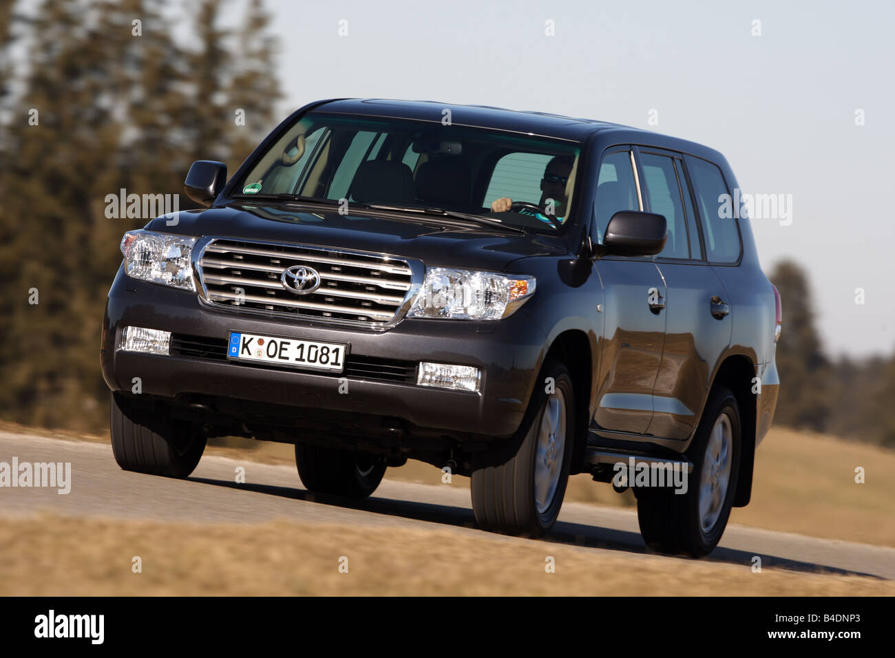 Toyota Landcruiser V8 4.5 D-4D, model year 2008-, anthracite, driving,  diagonal from the front, frontal view, country road Stock Photo - Alamy