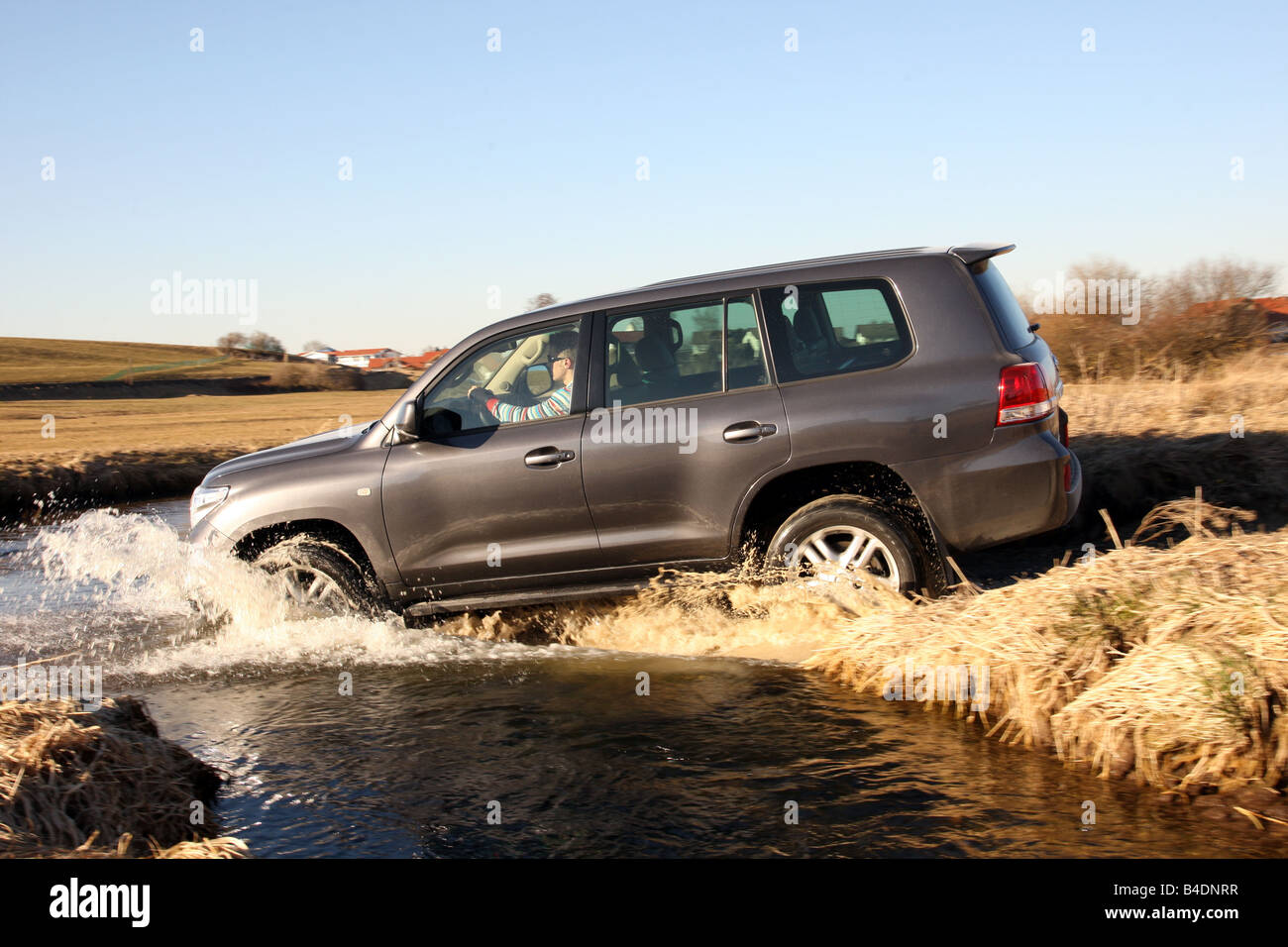 Toyota Landcruiser V8 4.5 D-4D, model year 2008-, anthracite, driving, side view, offroad, Water Stock Photo
