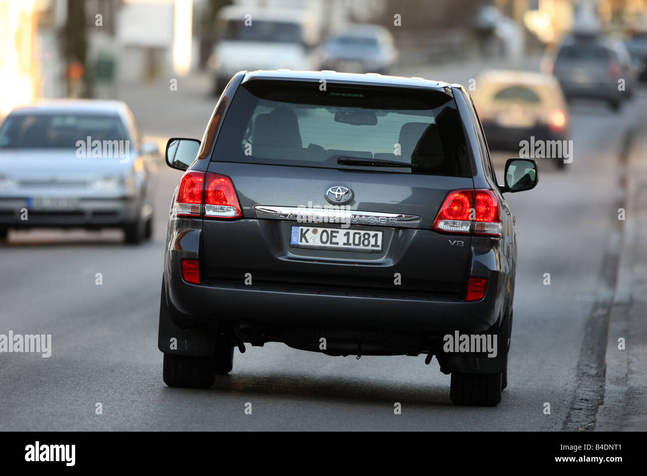 Toyota Landcruiser V8 4.5 D-4D, model year 2008-, anthracite, driving,  diagonal from the back, rear view, City Stock Photo - Alamy